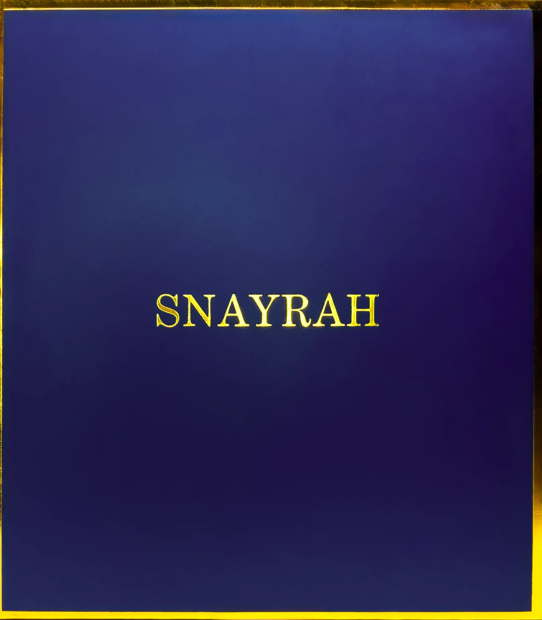 Premium Royal Blue Men Mini gift box for Snayrah brand, featuring gold foiling on the brand name in the center along with gold borders. This box is designed to hold cosmetic bottles for any occasion in India.