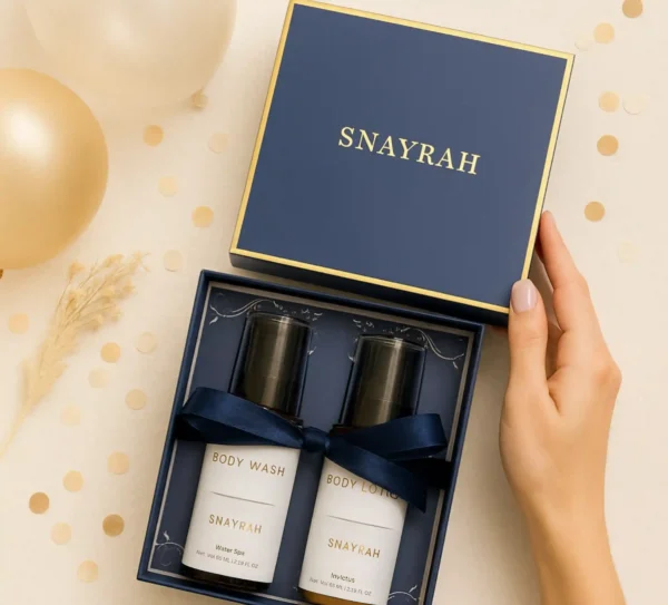 Snayrah gift boxes with skincare bottles and ribbons