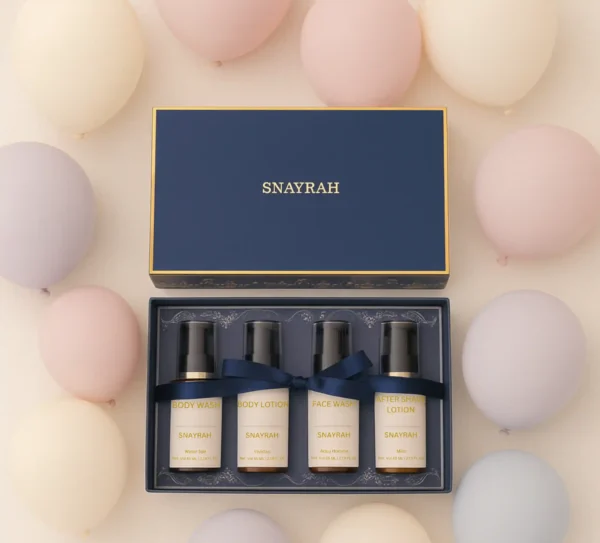 Open navy blue SNAYRAH gift box with four skincare products and festive pastel balloons
