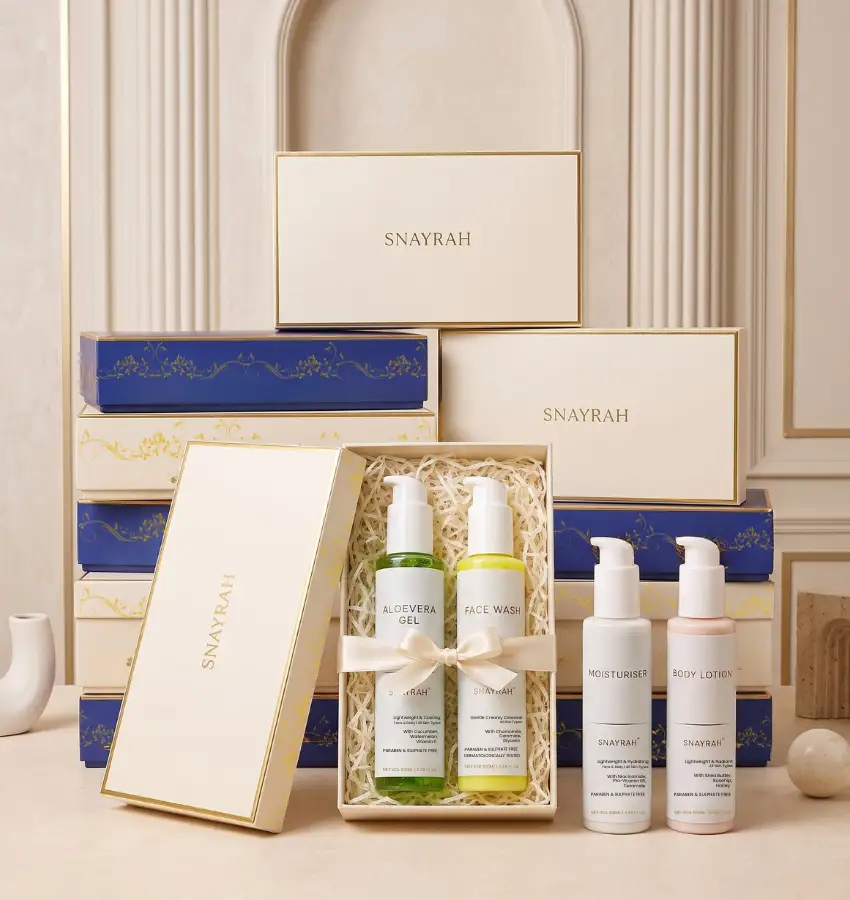Bulk Skincare Gift Sets SNAYRAH bulk skincare gift sets in cream and royal blue boxes with Aloe Vera Gel, Face Wash, Moisturiser and Body Lotion