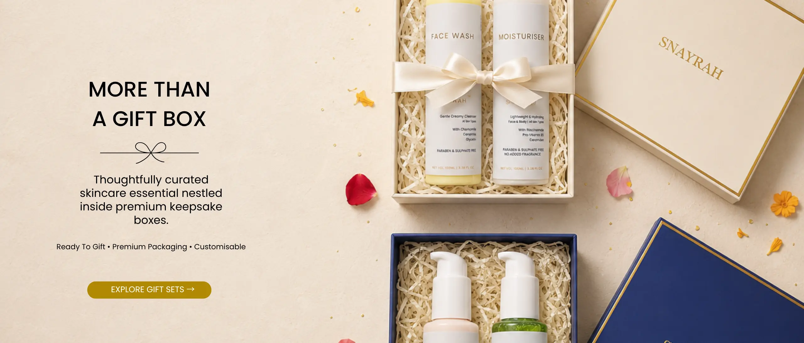 Premium Skincare & Gift Sets SNAYRAH skincare products arranged inside premium cream and blue customisable gift boxes