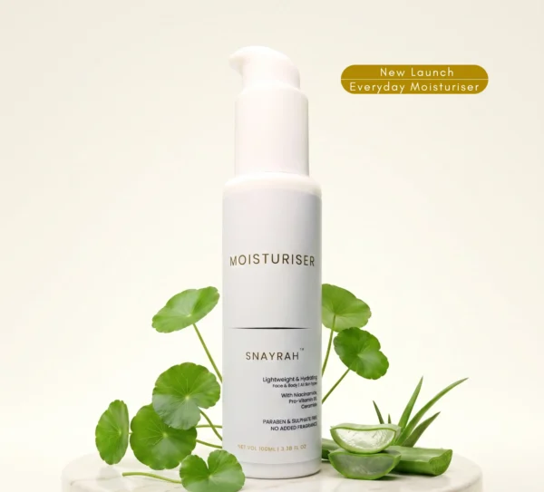 SNAYRAH Face & Body Moisturiser bottle displayed with botanical ingredients and a new launch message