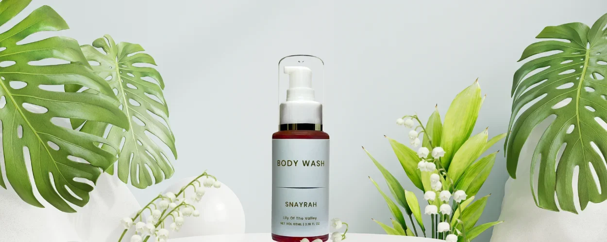 Snayrah Body Wash for Her with Lily of the Valley fragrance, featuring flowers for representation.